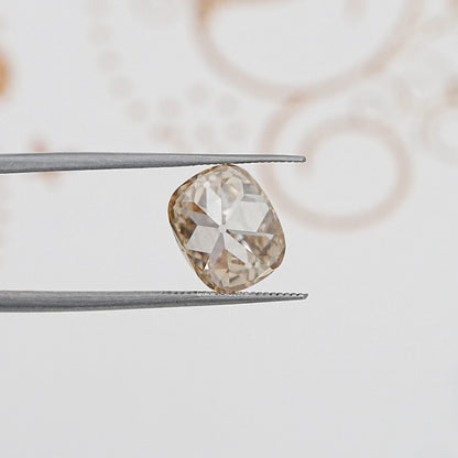 In Tweezer View Of Old Mine Cushion Cut Loose Moissanite Stone