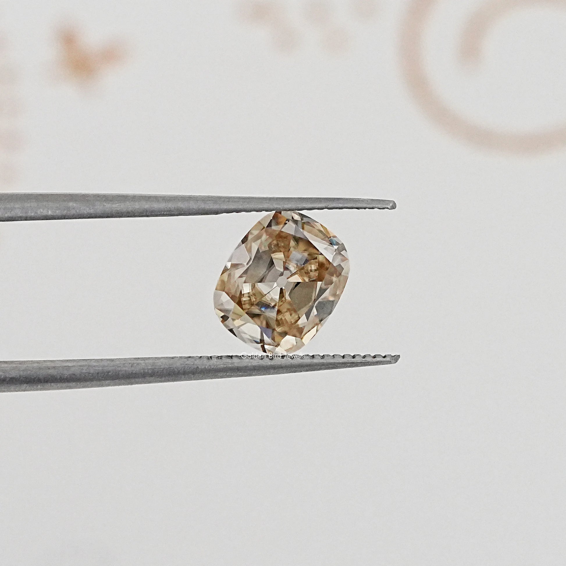 In Tweezer View Of Old Mine Cushion Cut Loose Moissanite Stone
