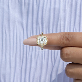 In finger front view of Cushion Cut Moissanite Solitaire Ring
