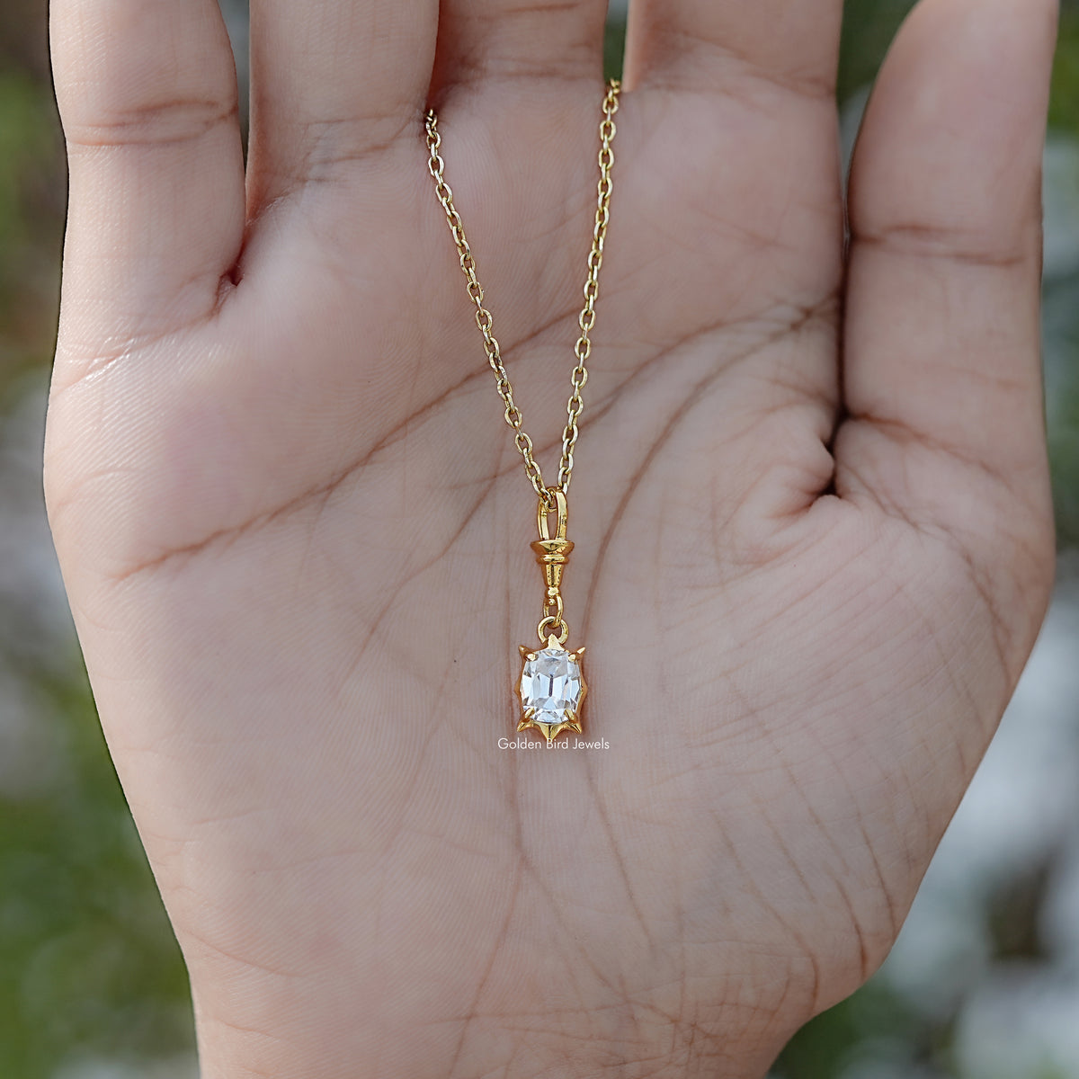 Close View Of Old Mine Cushion Moissanite Pendant in Secure Setting 