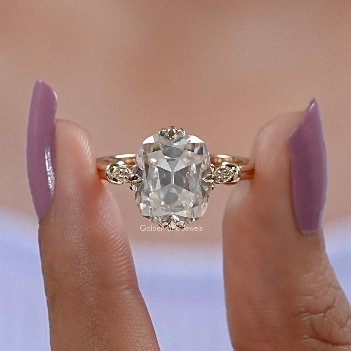 Front View of Old Mine Elongated Cushion Cut Moissanite Ring In two Fingers