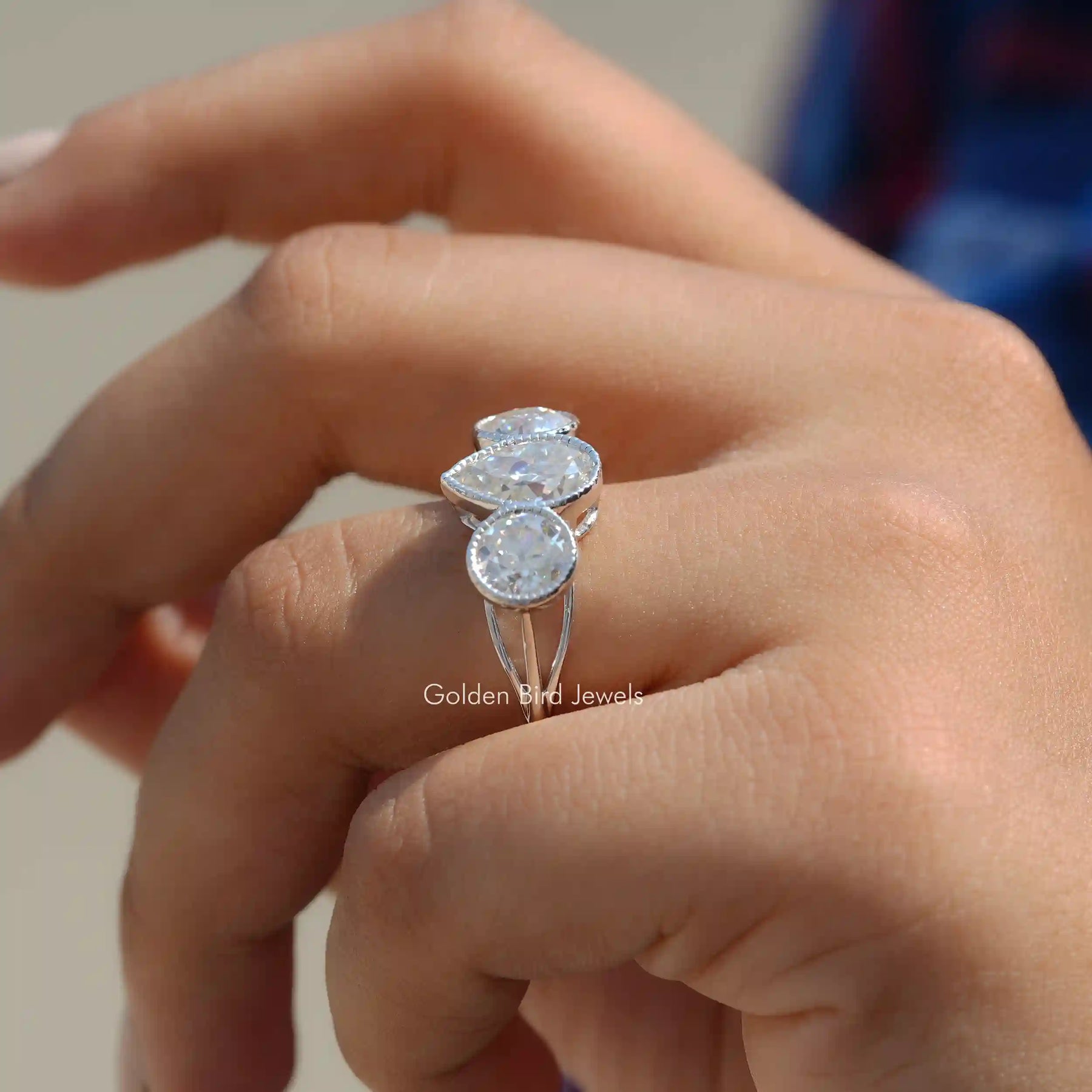 Side View of 3 Stone Moissanite Ring In finger