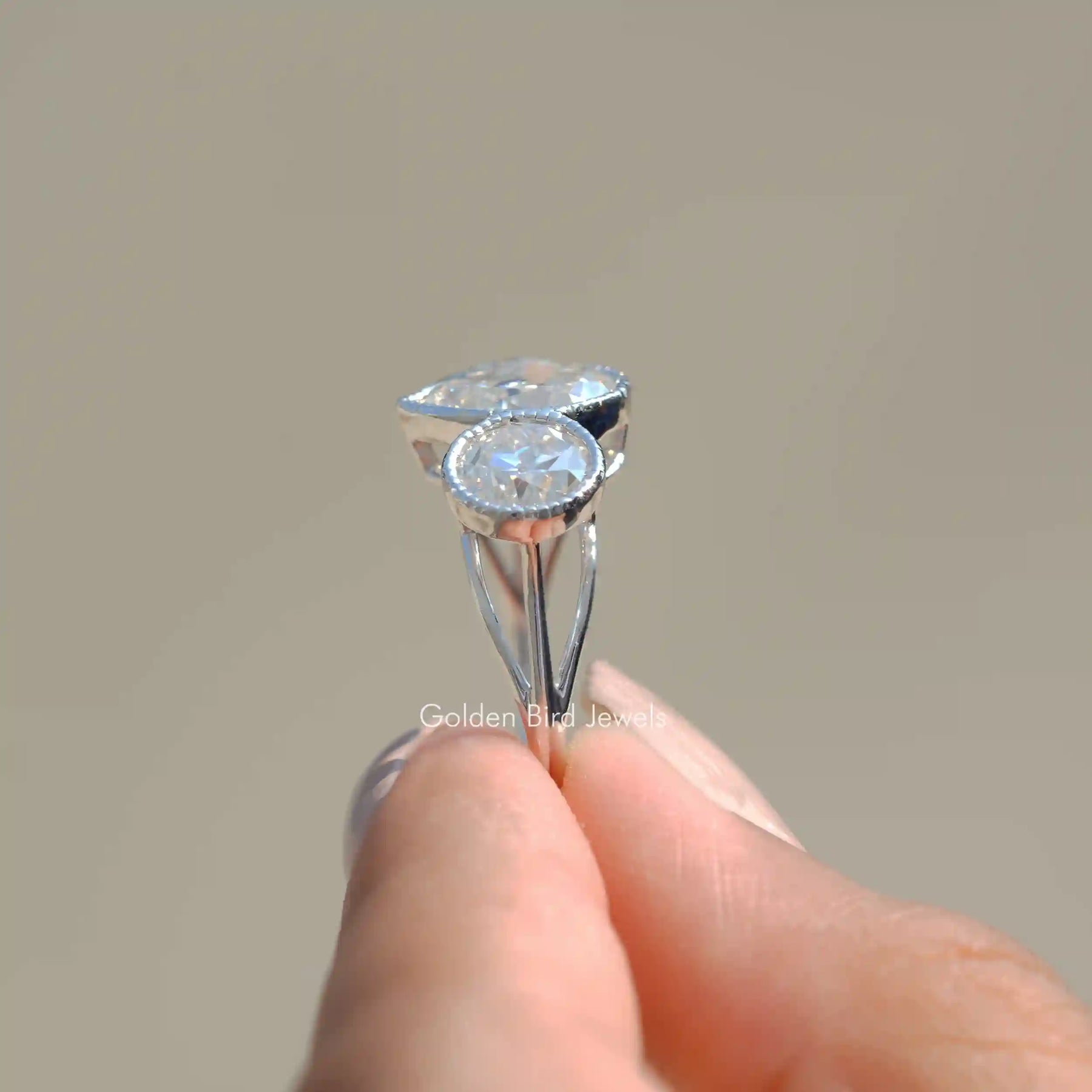 Side View of Bezel Set Old Mine Pear Cut Moissanite Ring In finger