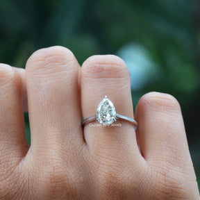 Detailed View Of Pear Cut Solitaire Moissanite Ring In White Gold