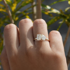 View of old mine pear cut and criss cut ring In Yellow Gold