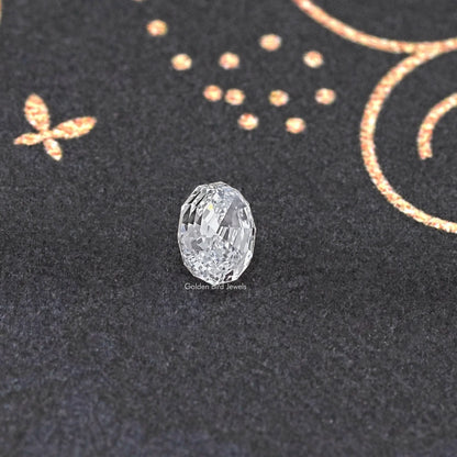 Loose lab-grown oval diamond close-up, step-cut facets and sparkle