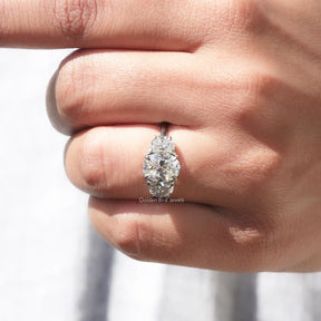 Close-Up View of Oval And Half Moon Moissanite 3 Stone Ring In White Gold