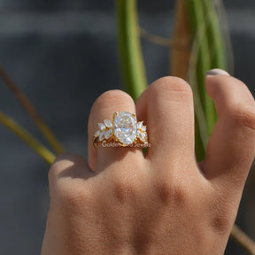 View of Moissanite Oval Cut Cluster Engagement Ring In Finger