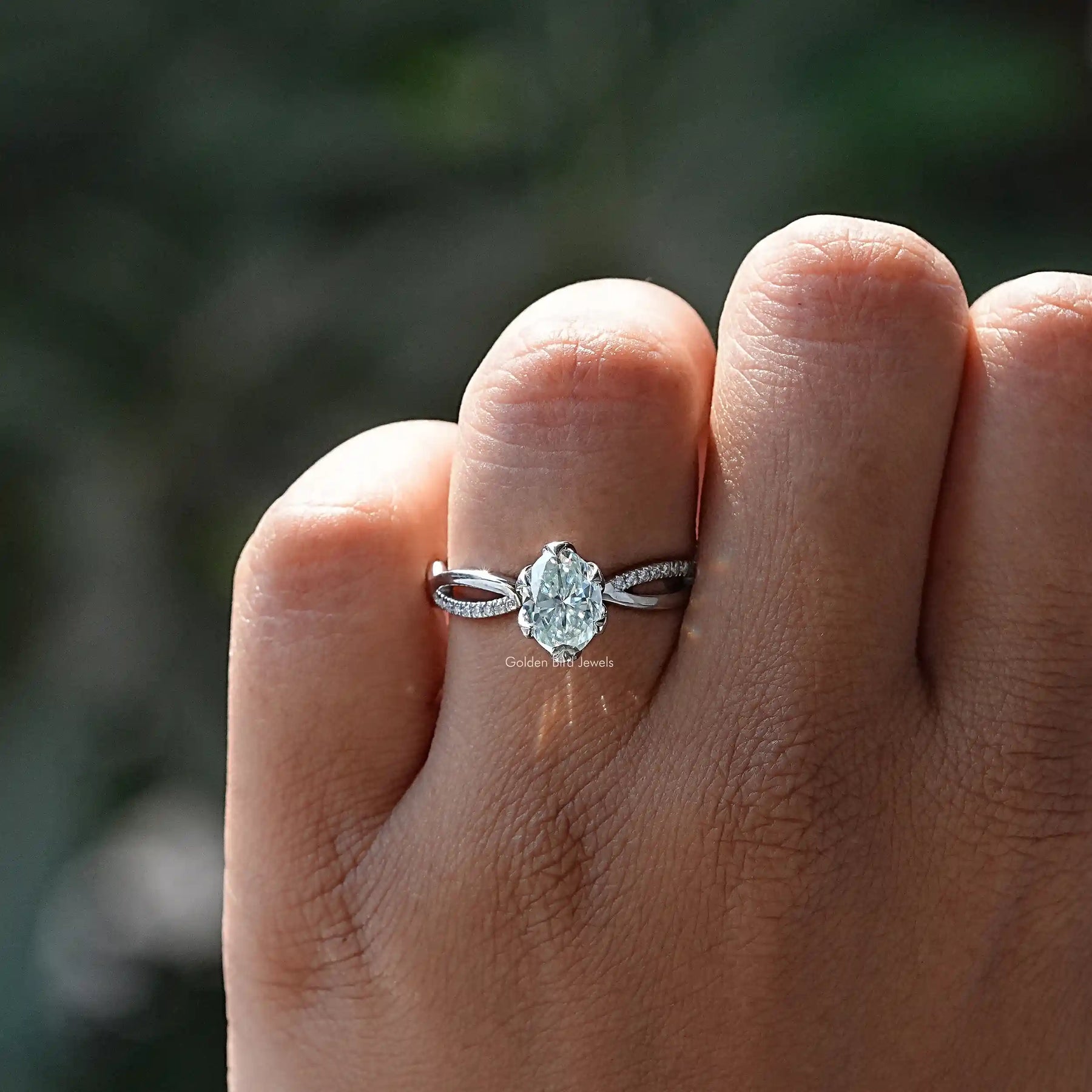 Oval Cut Moissanite Twisted Shank Engagement Ring