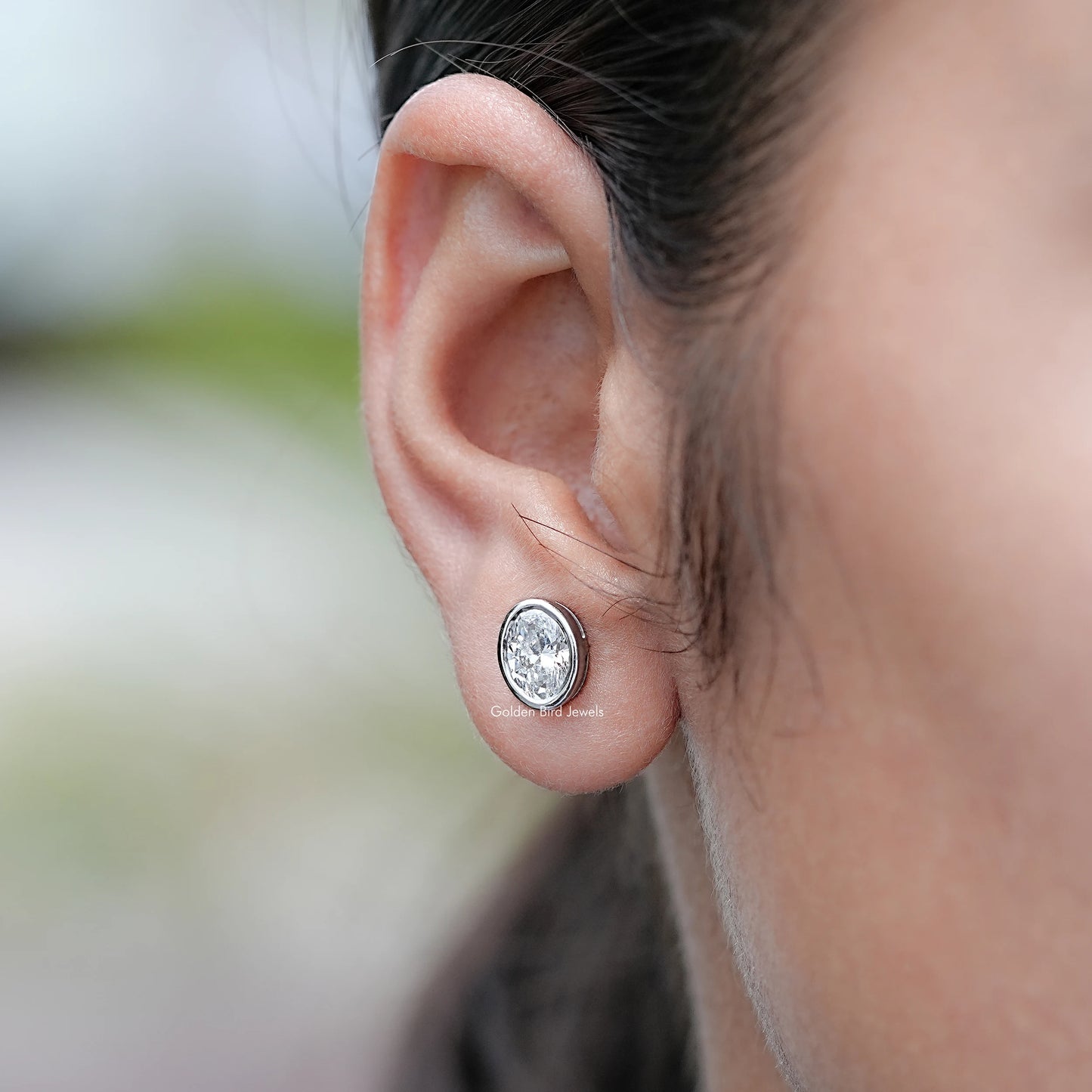 Side View of Oval Bezel Set Lab Diamond Stud Earrings
