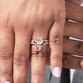 Detailed View Of Marquise And Oval Cut Moissanite Bridal Ring Set In Yellow Gold