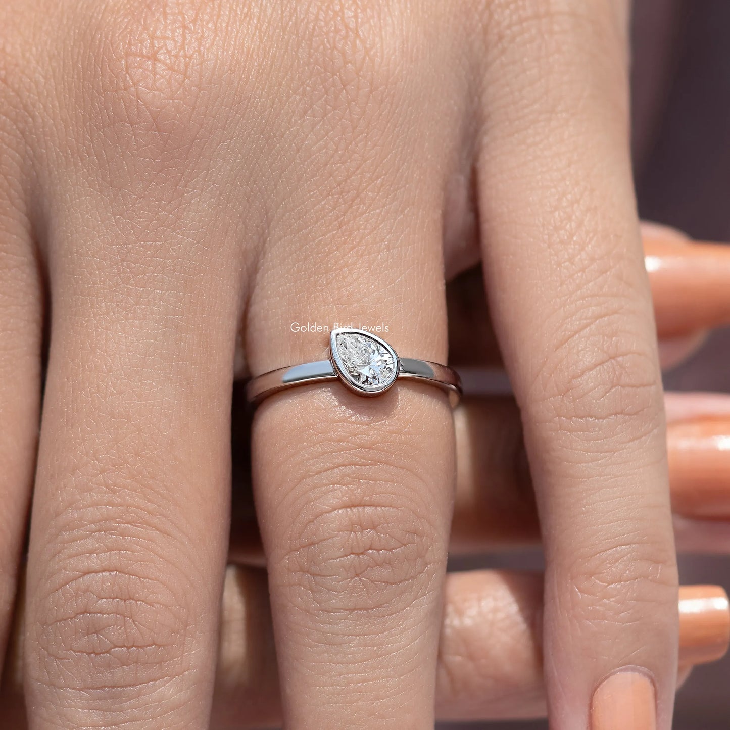 Bezel Set Pear Cut Lab Diamond Solitaire Ring