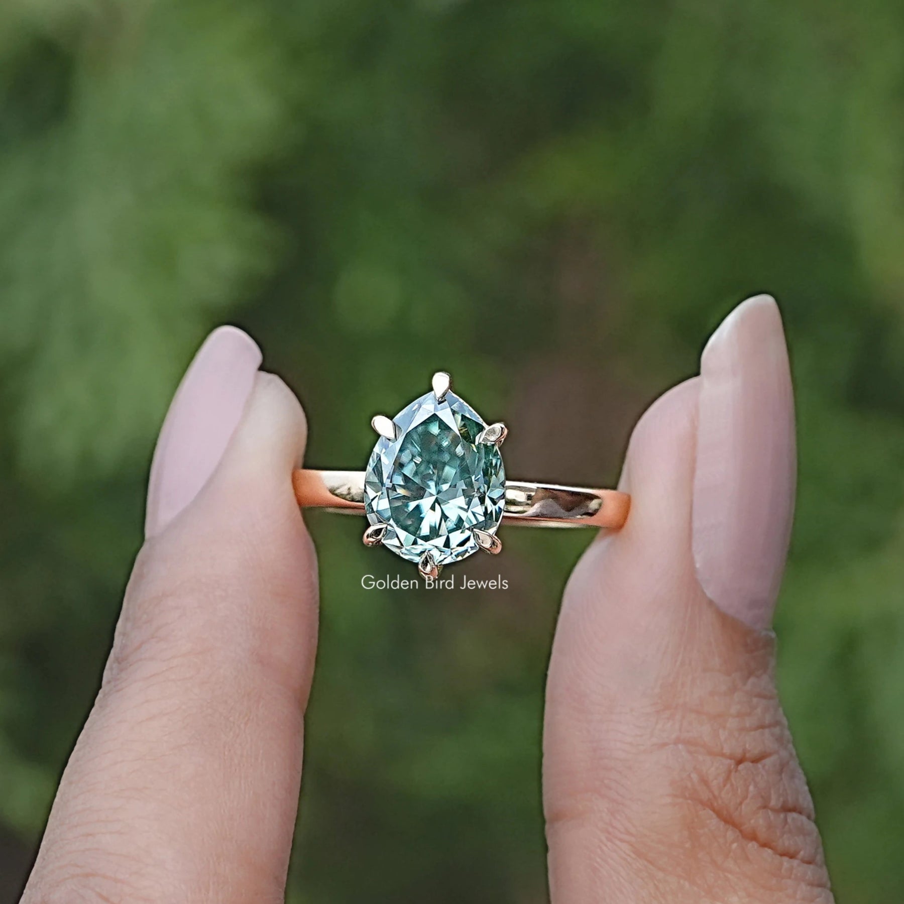 Pear Cut Green Moissanite Solitaire Ring