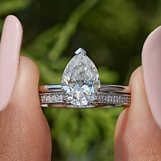 Birnenförmiger Moissanit-Ring mit verstecktem Halo und Ewigkeit-Band