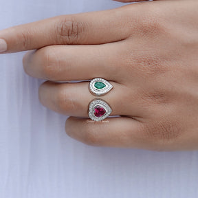 View of Pear And Heart Cut Moissanite Ring in prongs setting 
