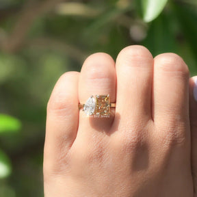 Finger view of moissanite  engagement ring In secure setting  