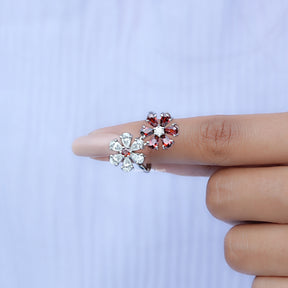 In finger front View of Pear Cut Gemstone Cluster Bypass Ring In White Gold