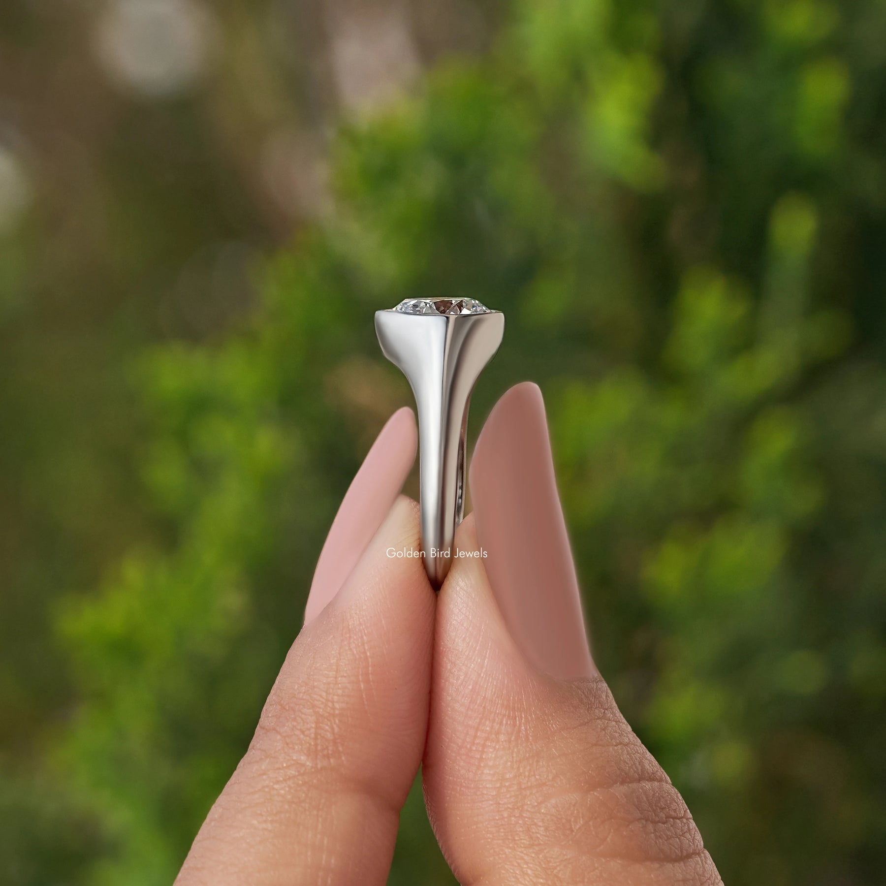 Pear Cut Lab Grown Bezel Set Engagement Ring