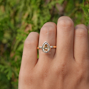 Yellow Pear Cut Moissanite Bezel Set Solitaire Ring