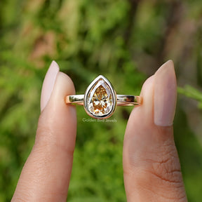 Yellow Pear Cut Moissanite Bezel Set Solitaire Ring