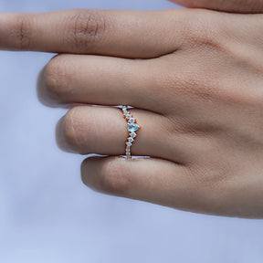 View of Pear and Round Cut Moissanite Ring in prongs setting 