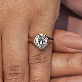 Pear Cut Lab Grown Bezel Set Engagement Ring