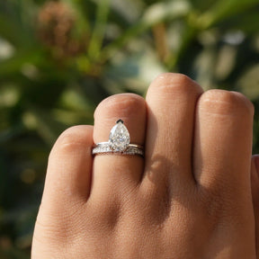 Close-Up View of Moissanite Pear Cut Hidden Halo Ring In White Gold