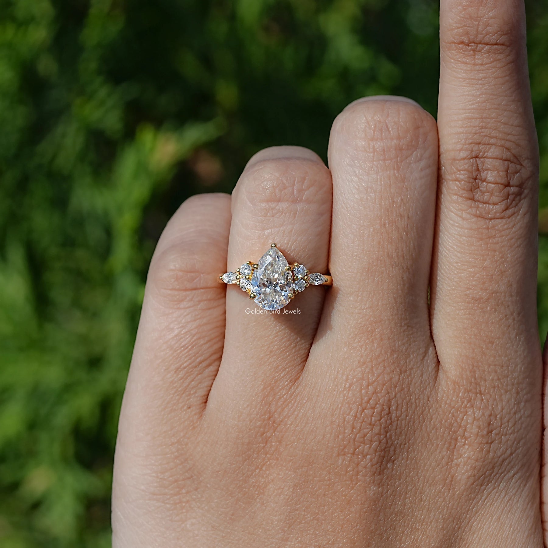 Pear Shaped Moissanite Accent Engagement Ring