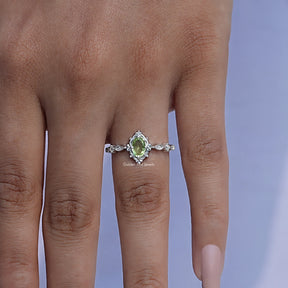 Oval Cut Accent Stone Ring In finger