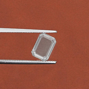 Twijer holding the Portrait Emerald Cut Loose Lab Diamond