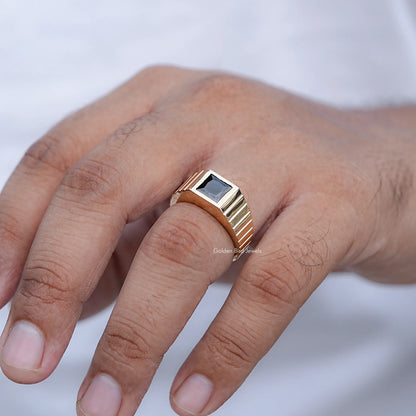 In finger front view of Black Gemstone Solitaire Men's Ring in unique shape