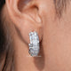 Front view of Princess Cut Moissanite Hoop Earring Set in two fingers 