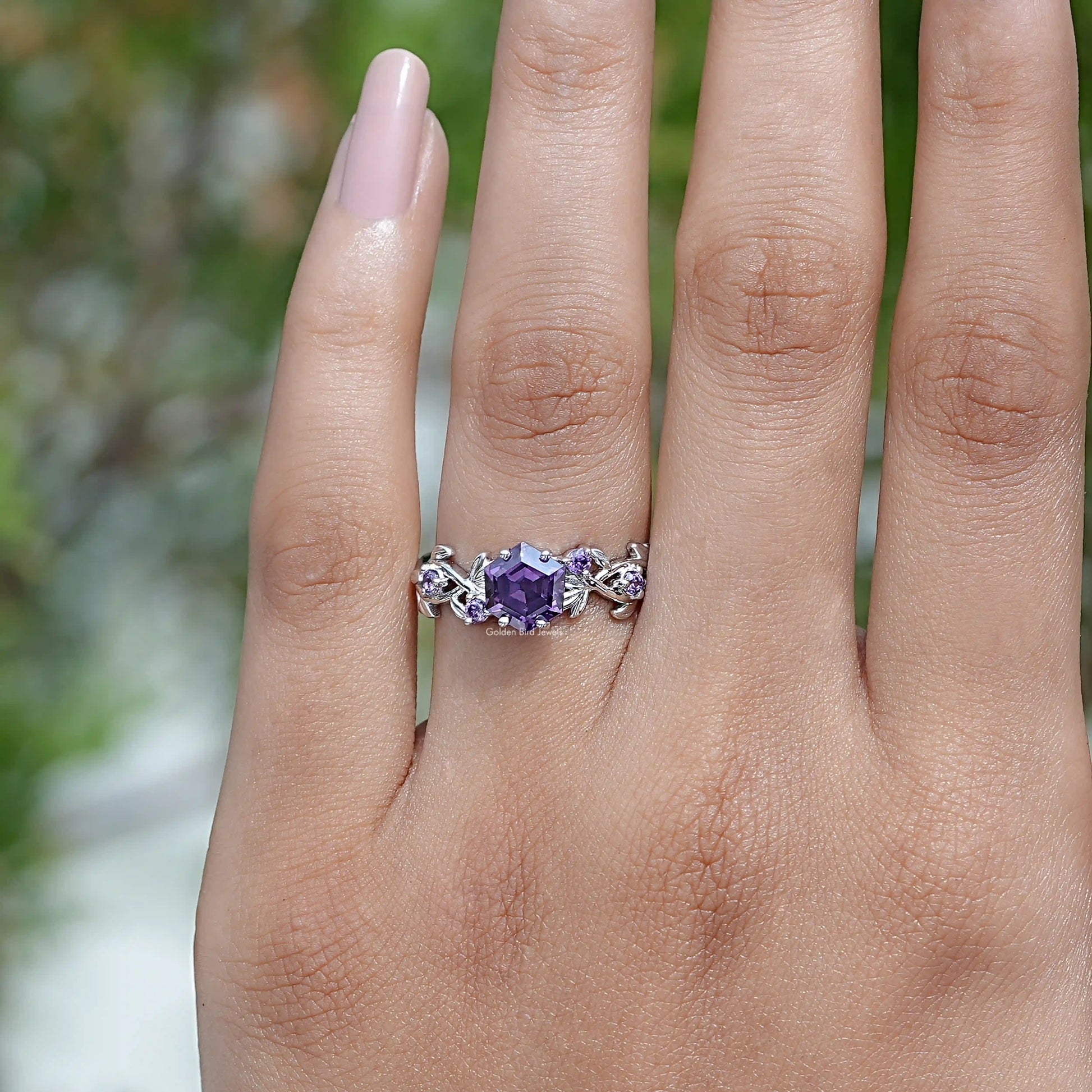 In finger front View of Round Cut Engagement Ring In White Gold