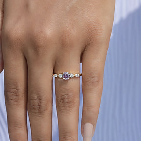Detailed View of Round Cut Gemstone Accent Ring In Yellow Gold