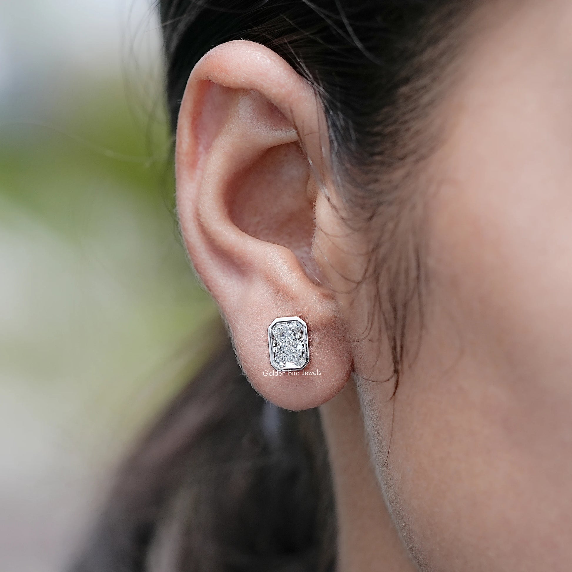 In Ear View of Radiant Cut Lab Grown Diamond Stud Earrings
