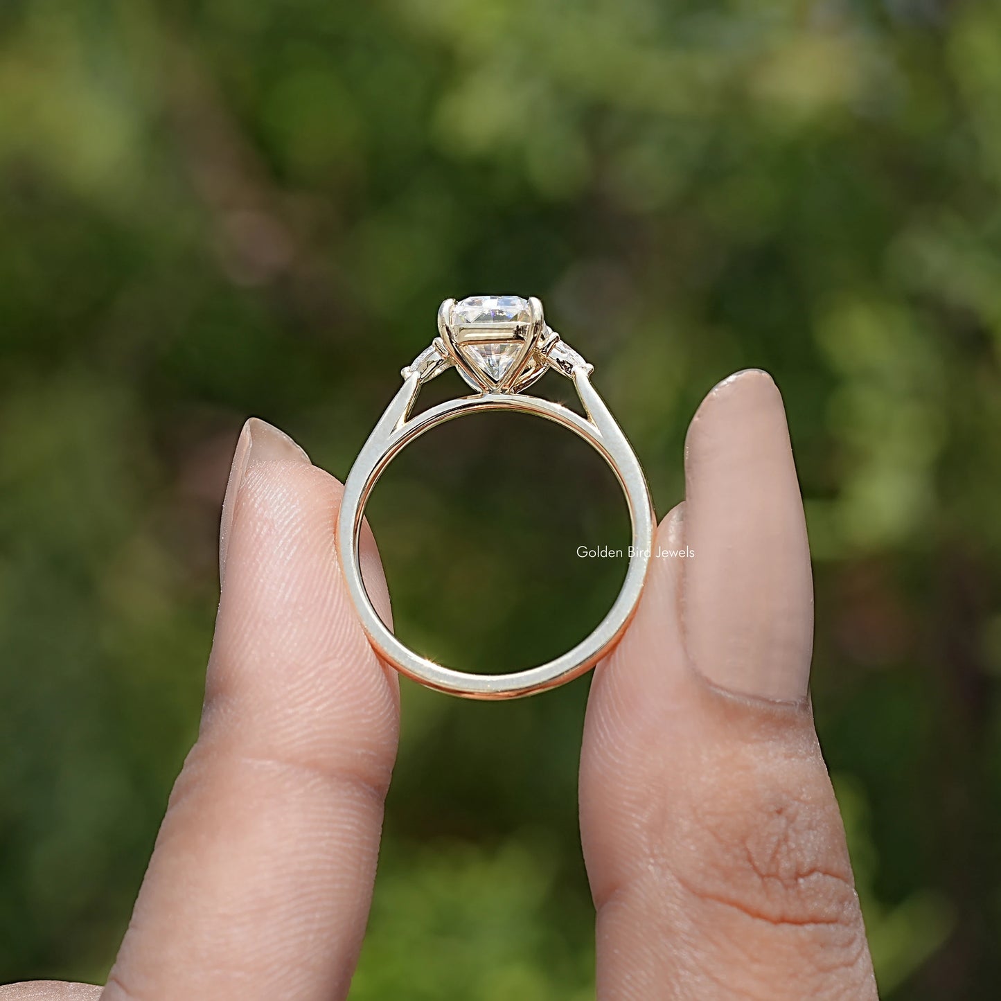 Back view of Radiant Cut Three Stone Engagement Ring in secure setting