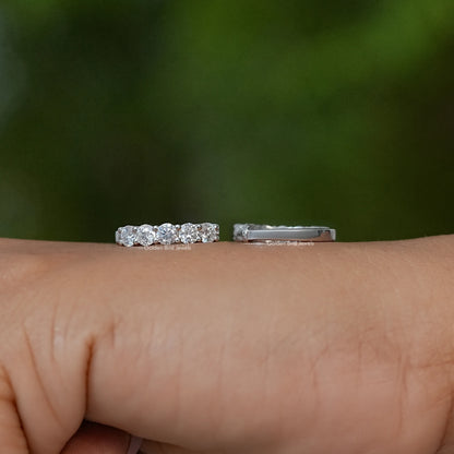 Moissanite round cut earrings with pavé-style stones, shown front and side views