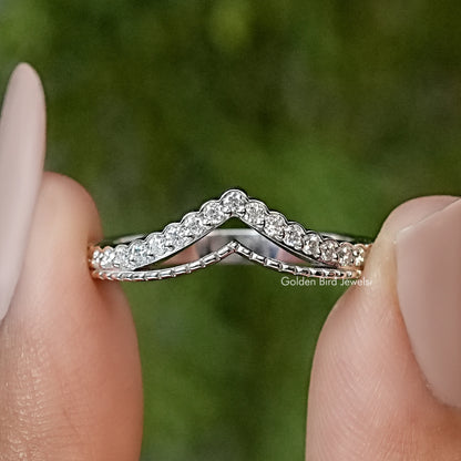 Silver V-shaped chevron wedding band with round moissanite sparkle stones
