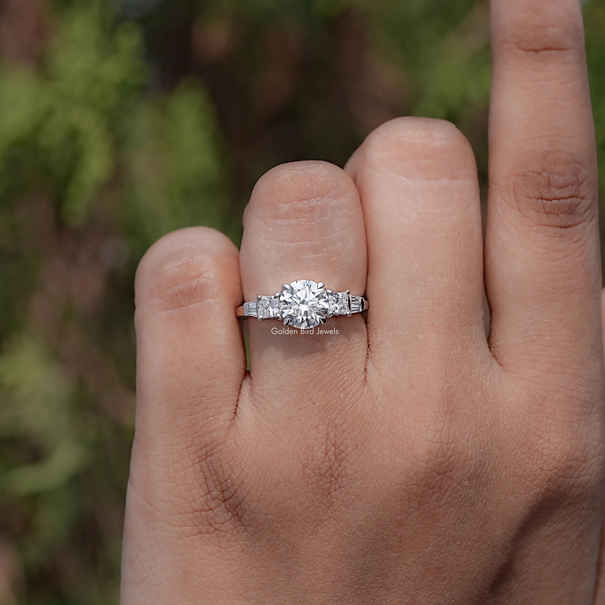 Front view of Round And Princess Diamond Five Stone Ring