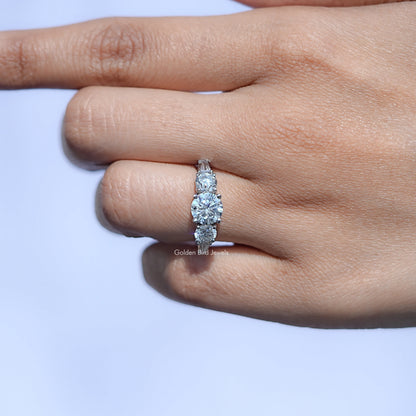 Round And Tapered Baguette Cut Five Stone Ring