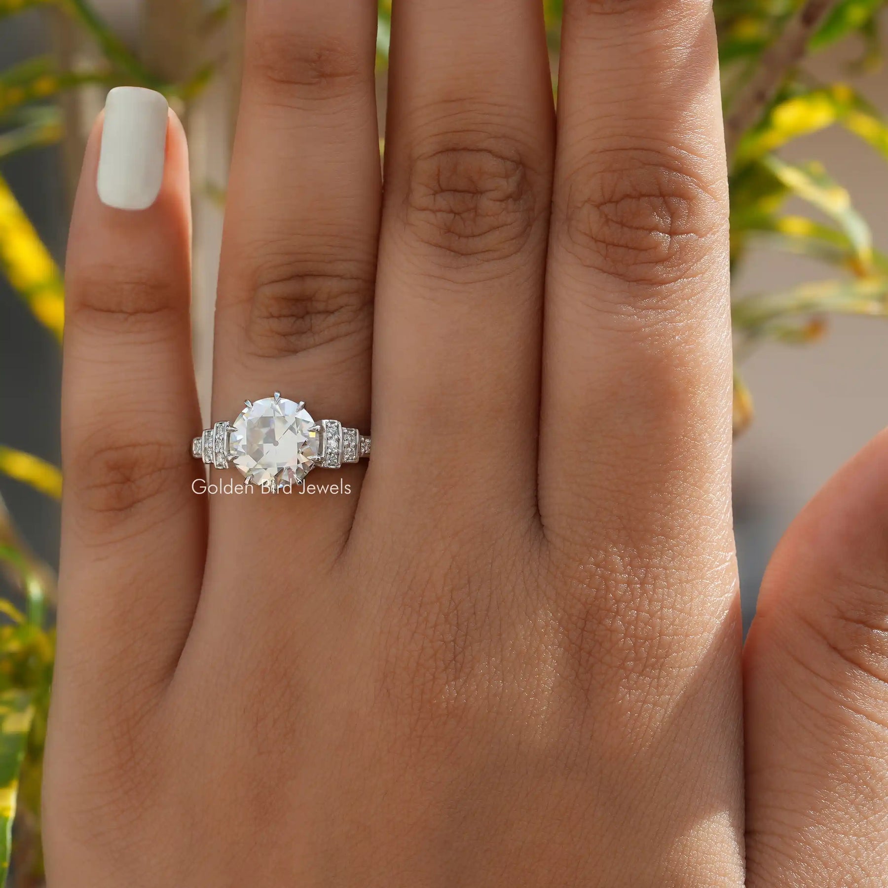 [In finger front view of round cut accent stone ring]-[Golden Bird Jewels]