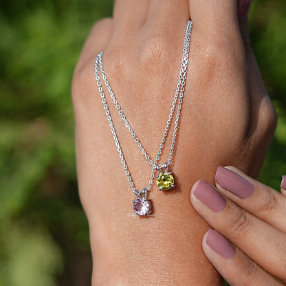 Two Round Cut Gemstone Pendant Necklace on Hand