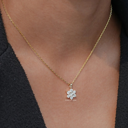 Close-Up View of Round Cut Lab Diamond Floral Pendant In Yellow Gold