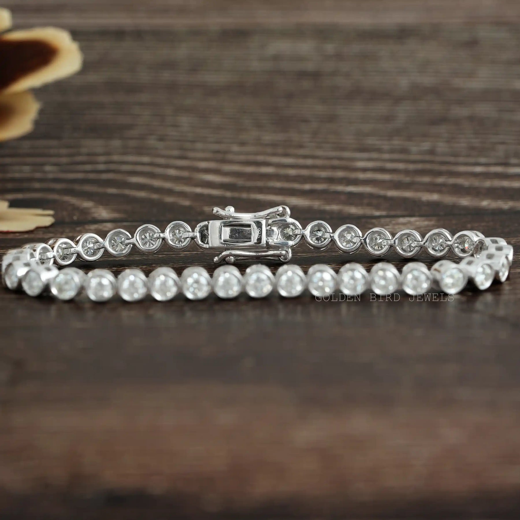 [Front view of round cut moissanite tennis bracelet in white gold]-[Golden Bird Jewels]