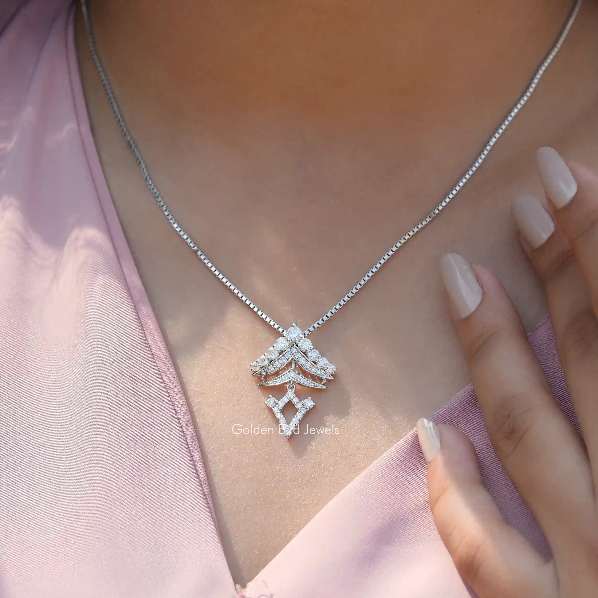 In neck view of round cut statement moissanite halo pendant 