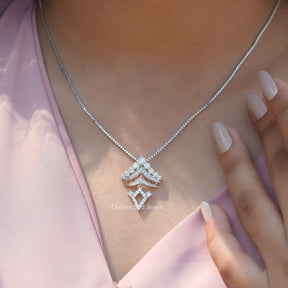 In neck view of round cut statement moissanite halo pendant 