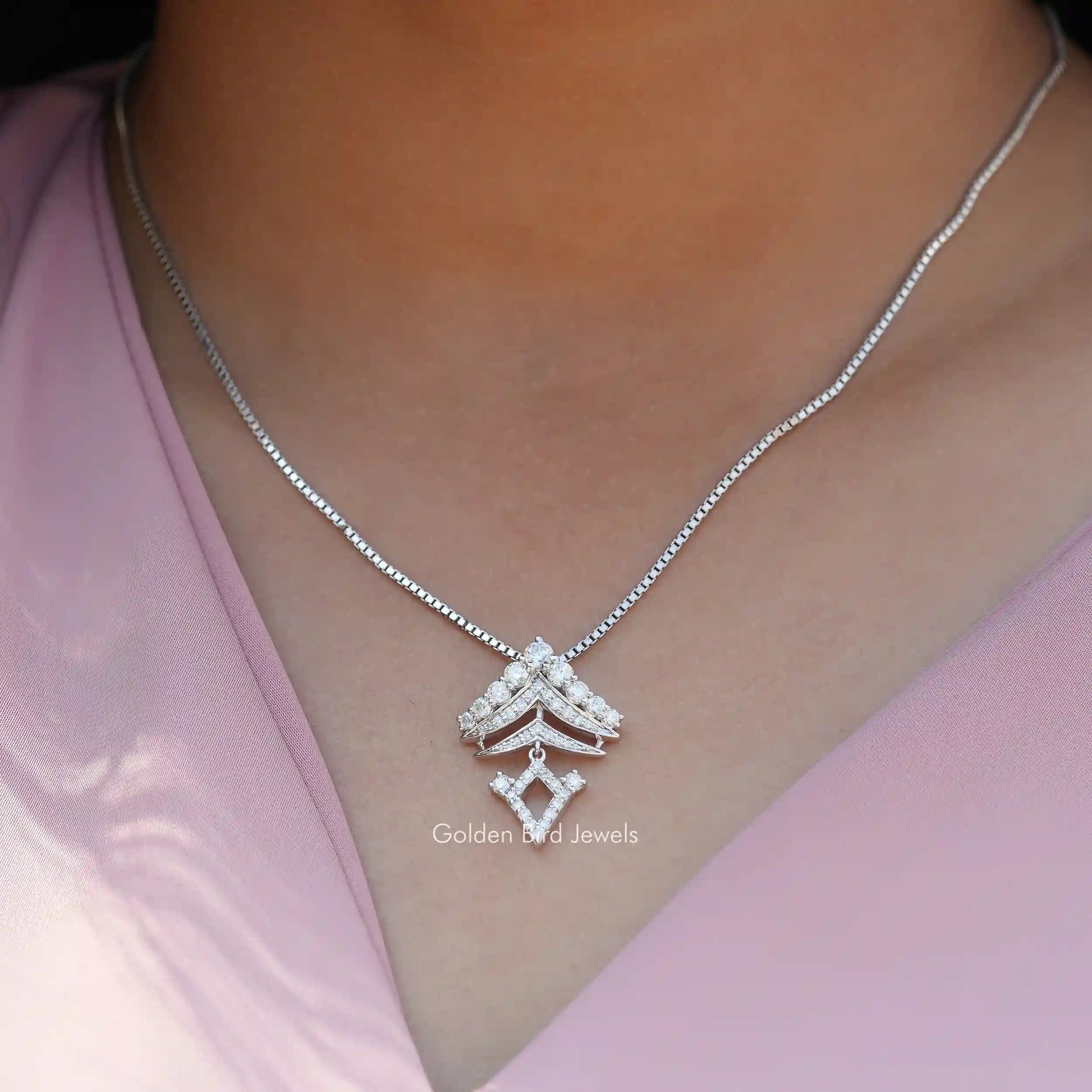 Full view of moissanite pendant in unique shape 