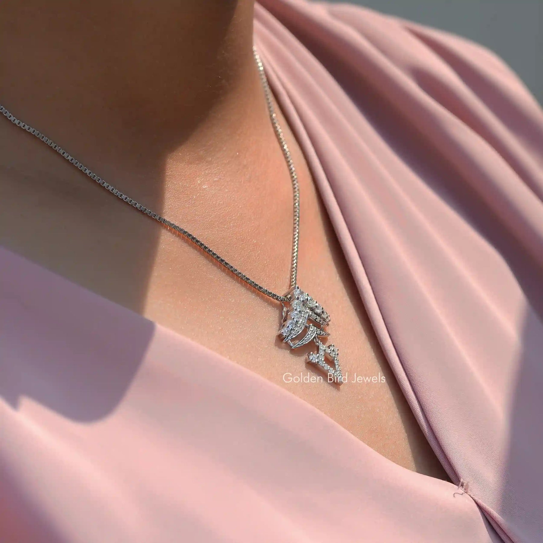 Close view of moissanite chain bracelet in secure setting 