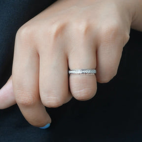 View of Round Cut Moissanite Wedding Band In finger
