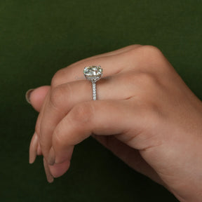 View of Round Cut Moissanite Engagement Ring In Finger